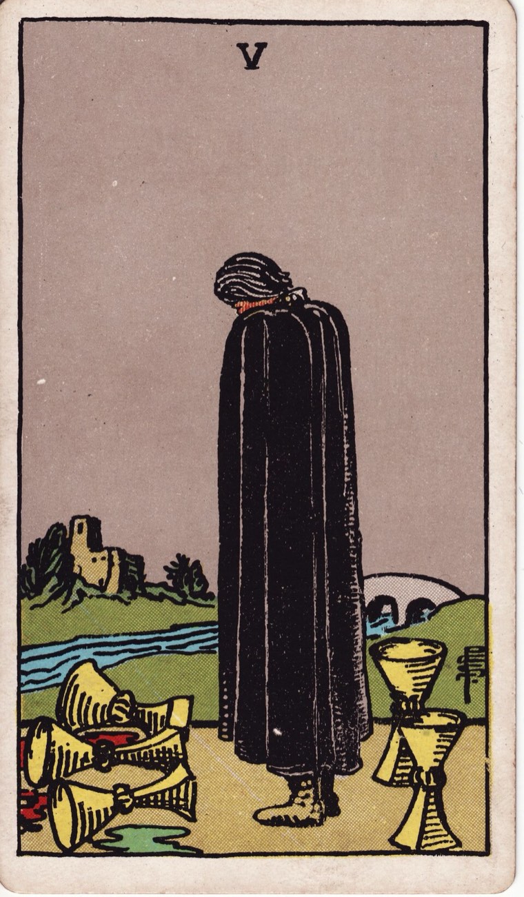 Five of Cups in the Waite–Smith 1909 deck: mourning figure, three spilled cups, two standing cups, path or bridge onward
