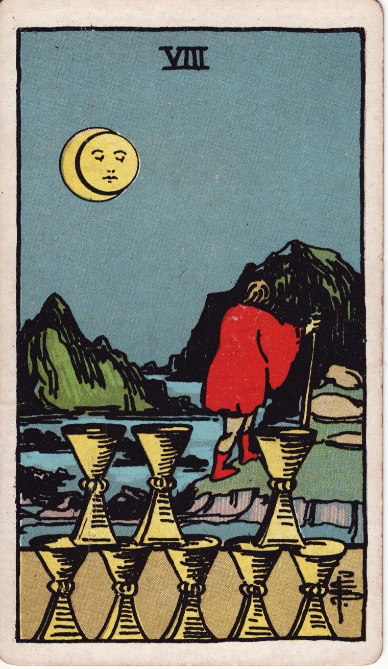 Eight of Cups in the Waite–Smith 1909 deck: figure departing, eight arranged cups left behind, difficult path under uncertain light