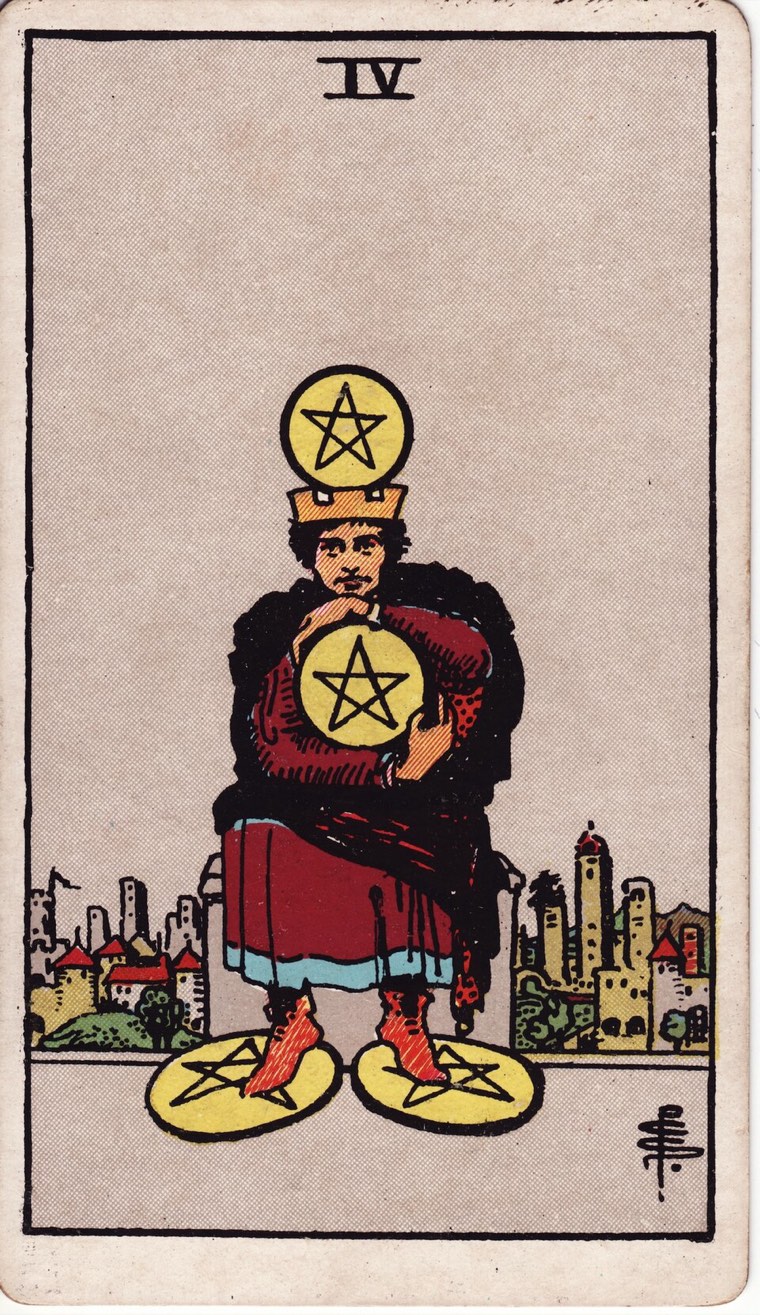Four of Pentacles in the Waite–Smith 1909 deck: figure tightly holding one coin, one coin controlled above, two coins secured below, city or community kept at distance