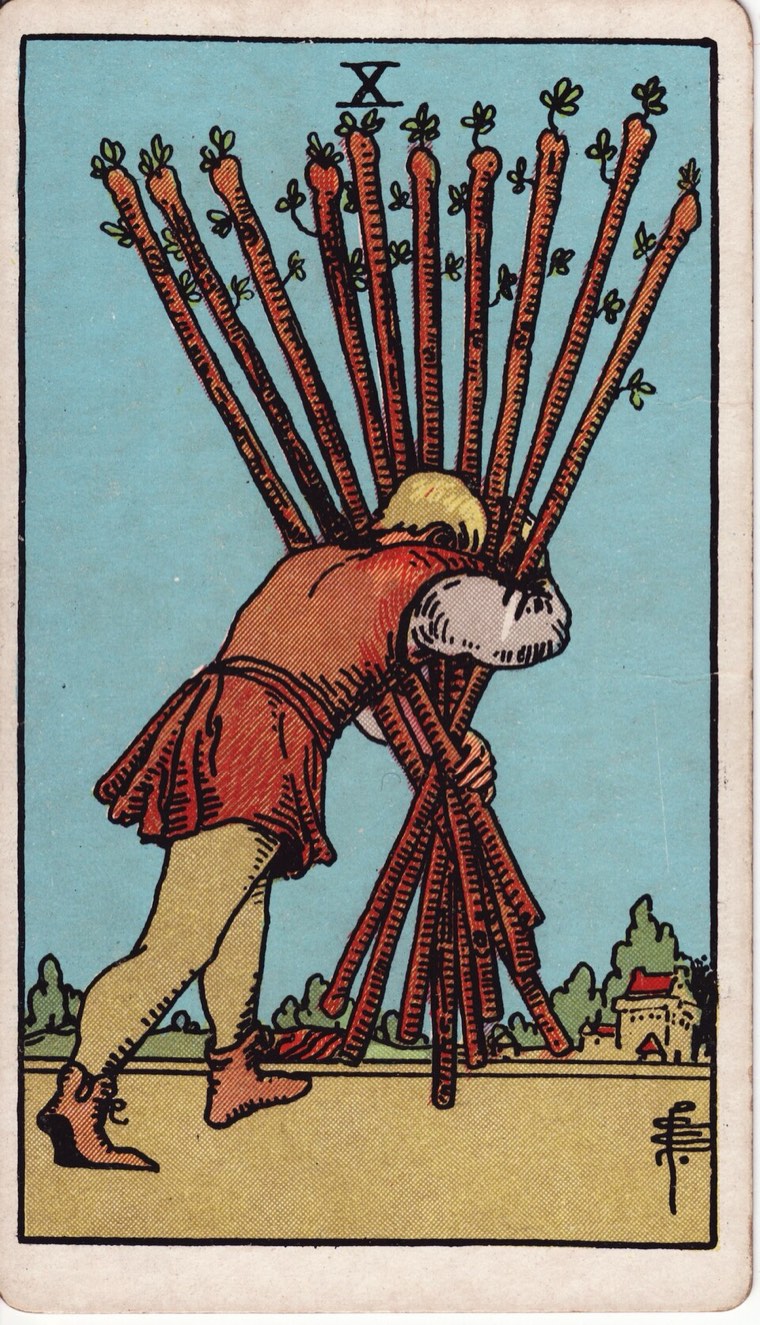 Ten of Wands in the Waite–Smith 1909 deck: single figure burdened by many wands, destination visible, restricted view or movement